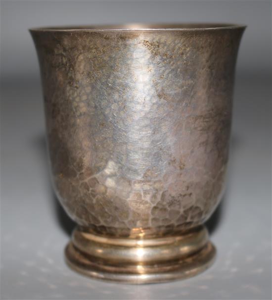 A late 19th century French 950 standard planished silver beaker, 91 grams.